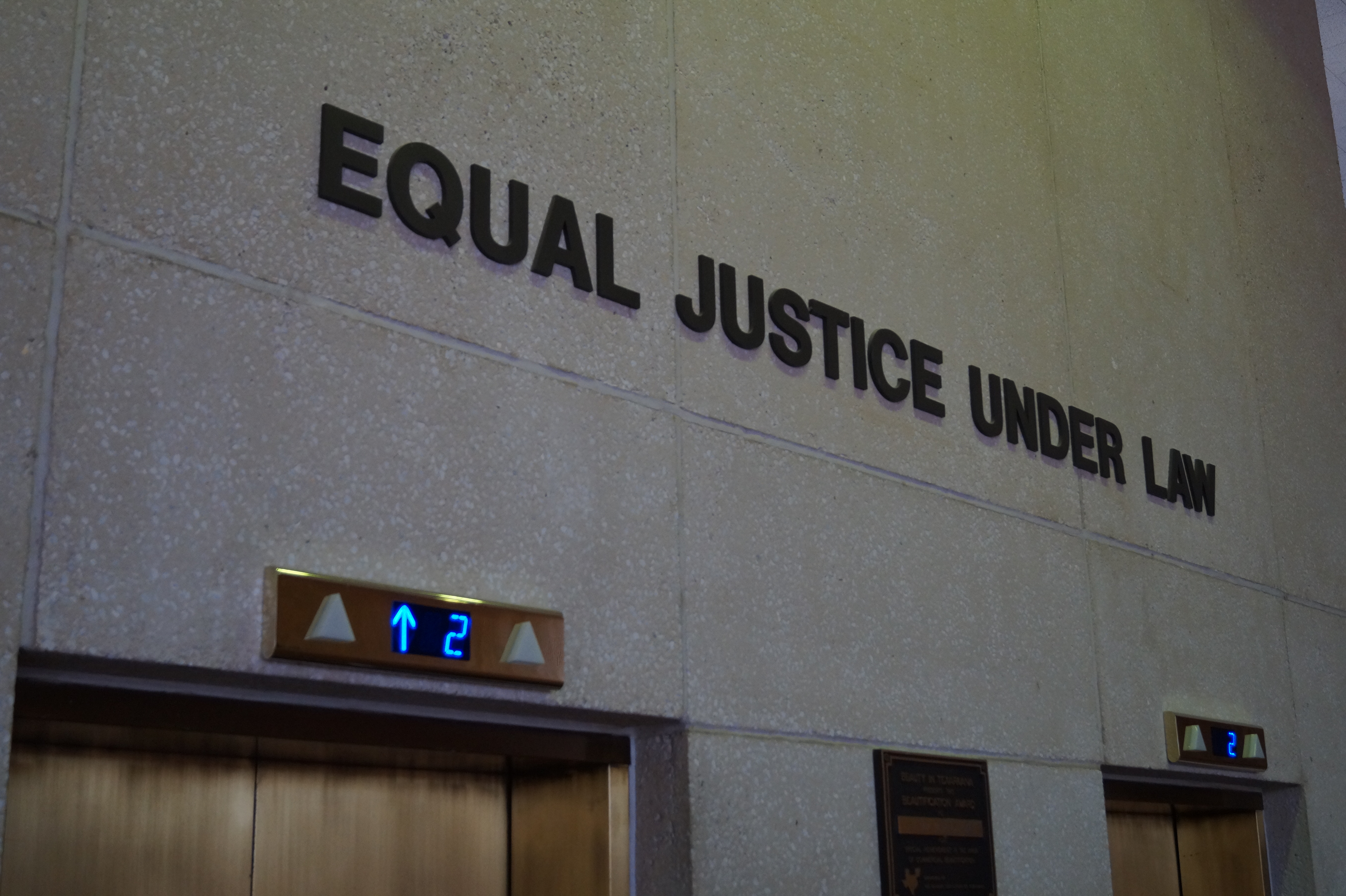 Equal Justice Under Law sign on wall